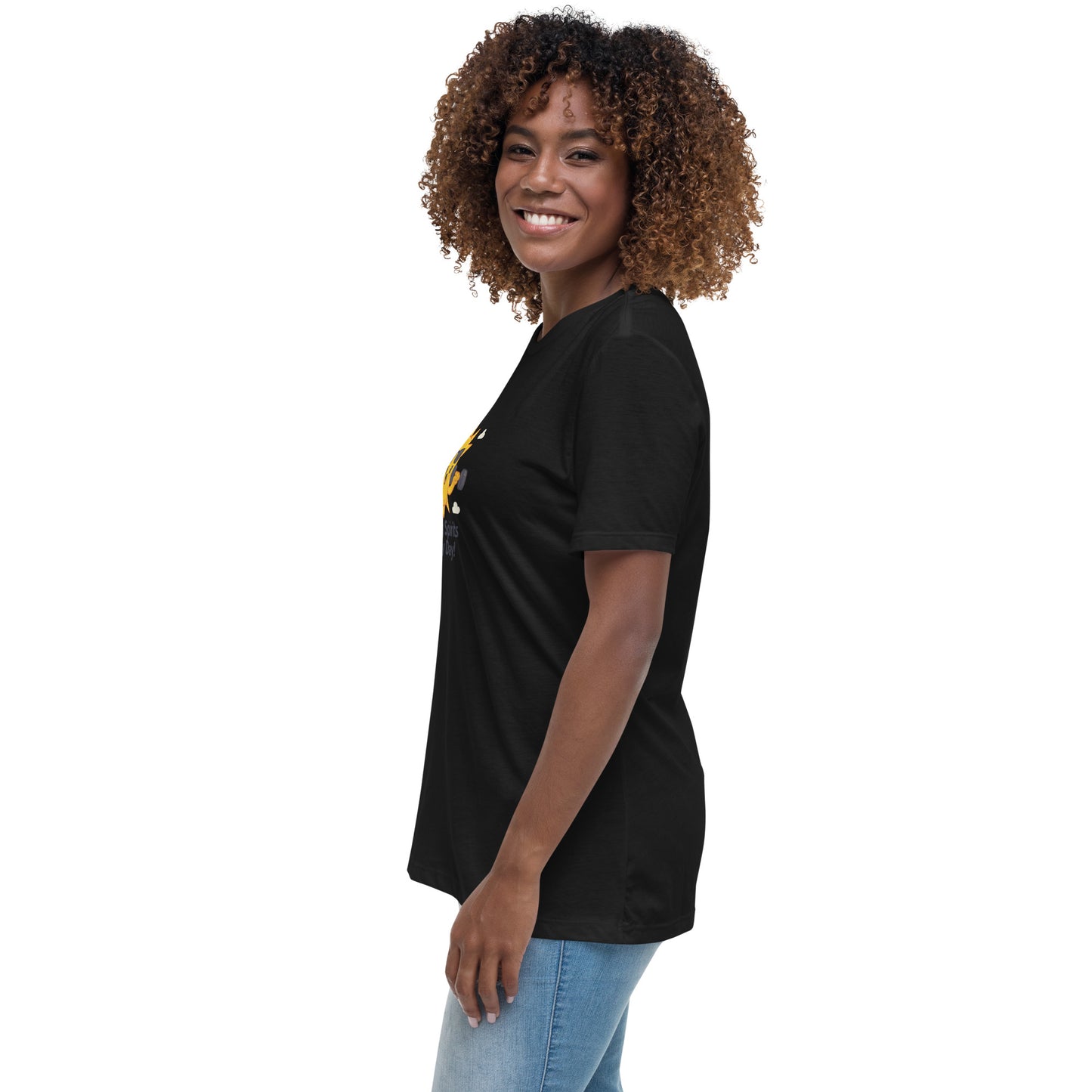Smiling woman wearing a black inspirational graphic tee for women with colorful design by Spirit Wear