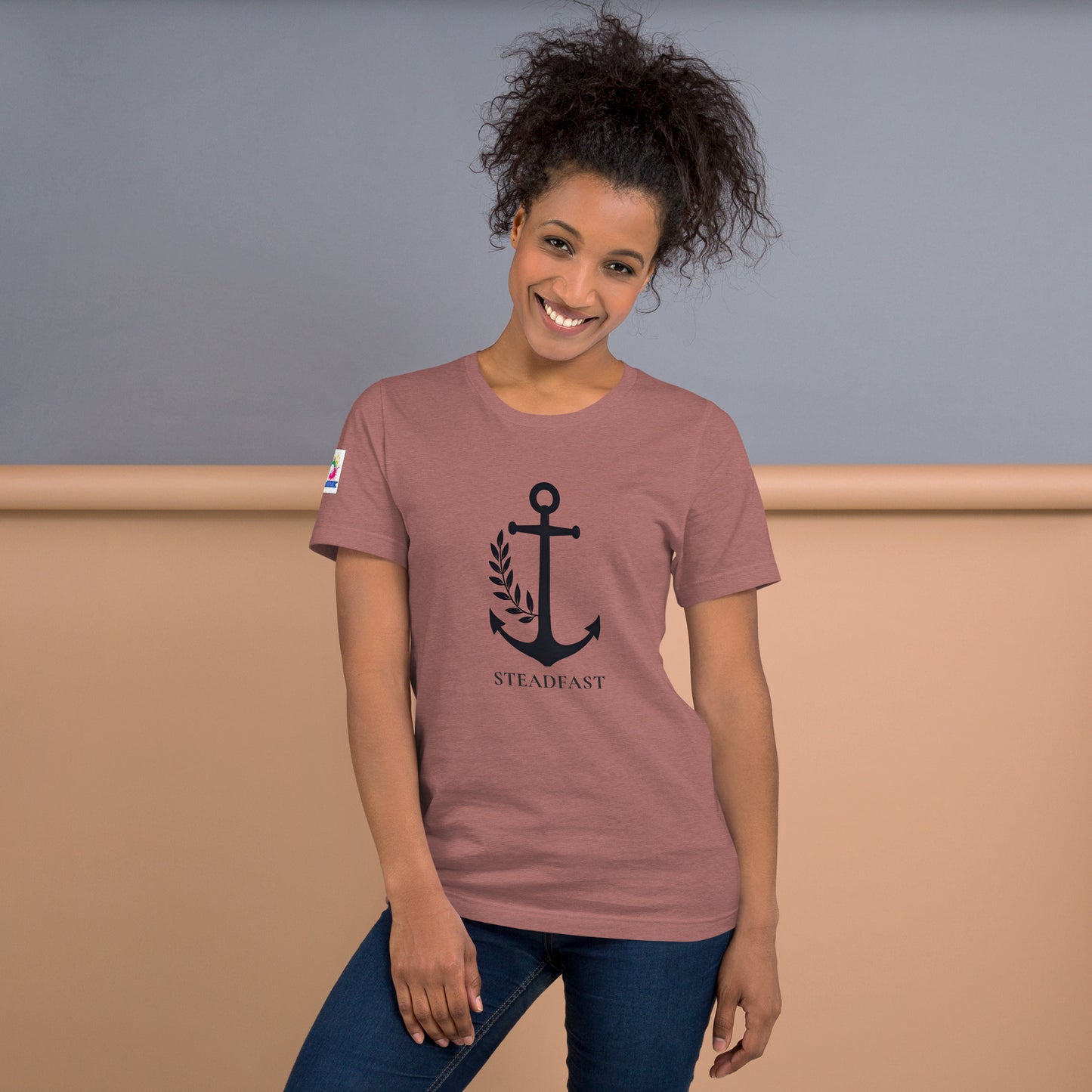 Spirit Wear Christian anchor shirt for men and women on smiling model in rose tee with black anchor Steadfast