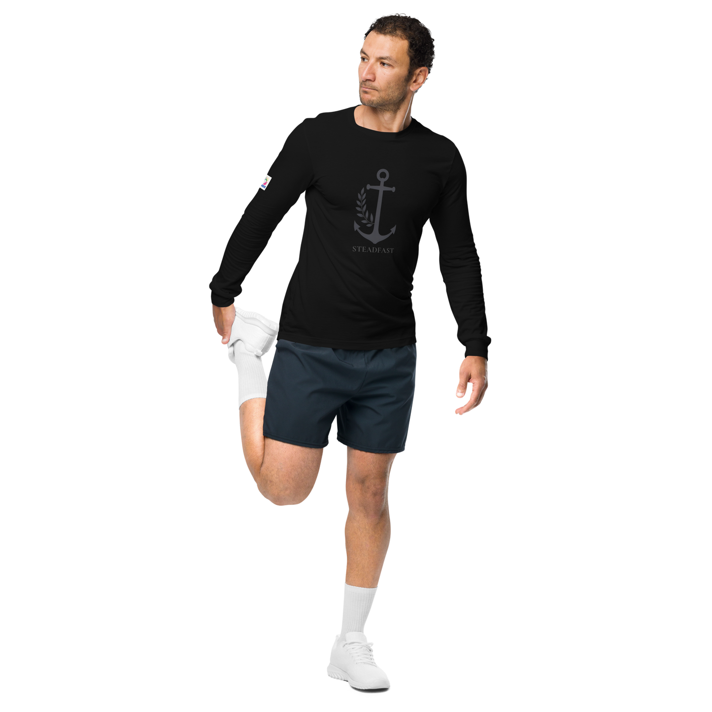 Spirit Wear inspirational long sleeve t-shirt black anchor graphic worn by male model stretching leg