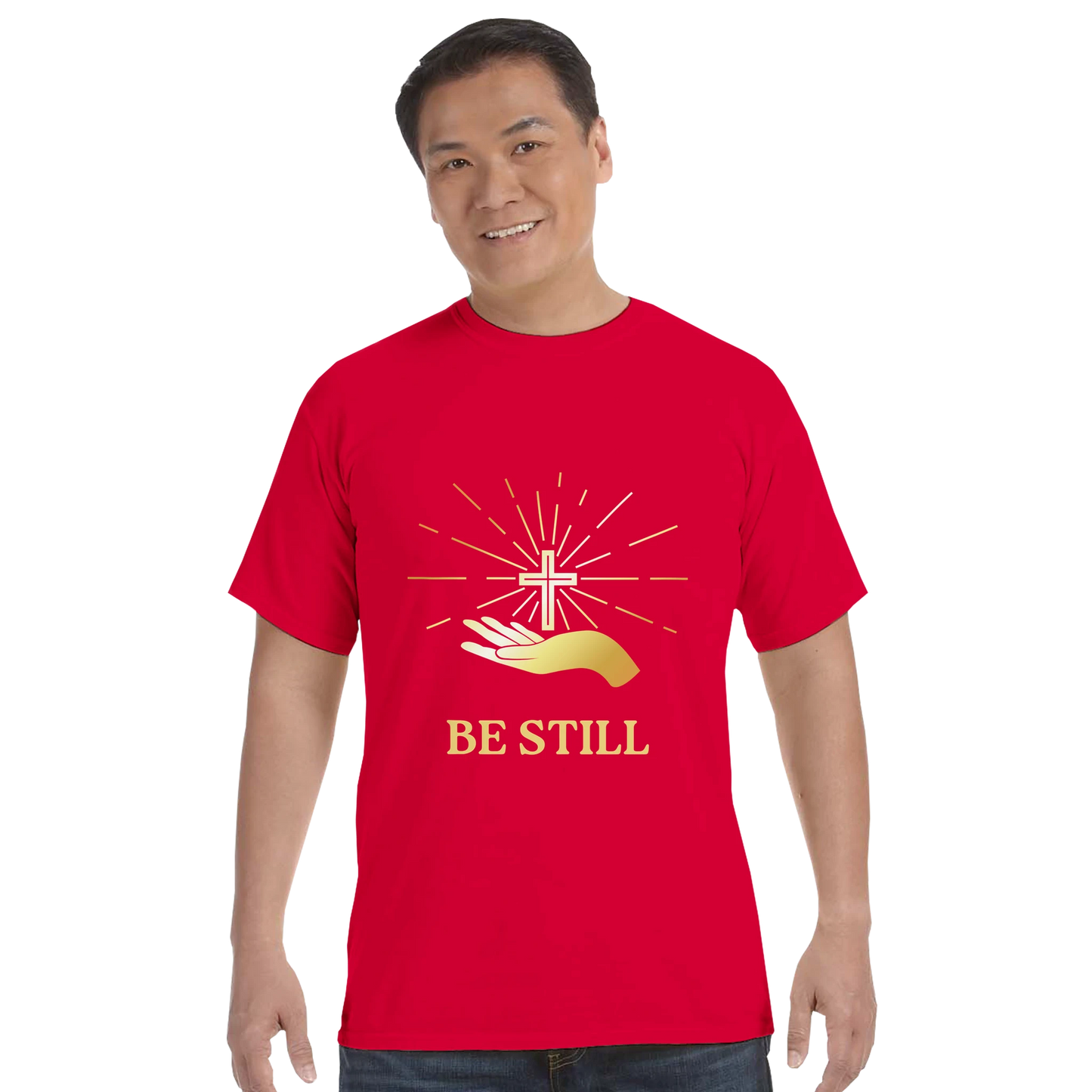 Men's red Christian graphic t-shirt featuring a cross and the phrase Be Still