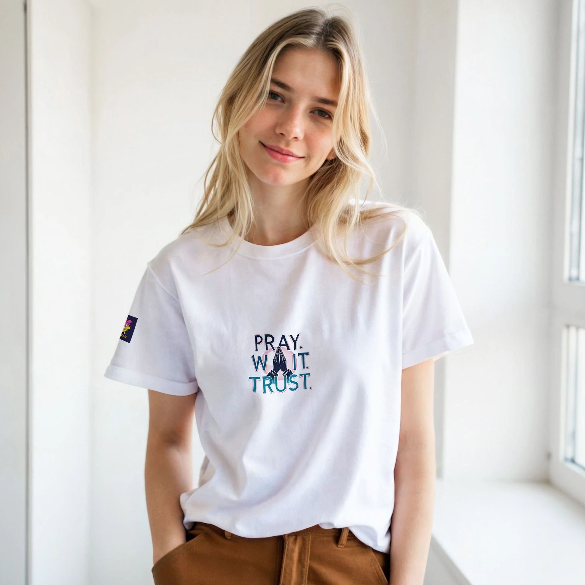 White Christian inspirational t-shirt with the graphic 'Pray. Wait. Trust.' for casual wear