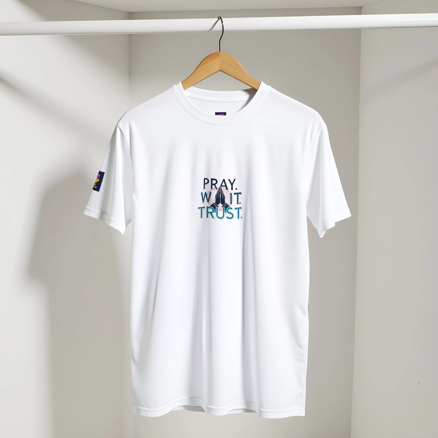 White Christian inspirational t-shirt featuring 'Pray. Wait. Trust.' text design