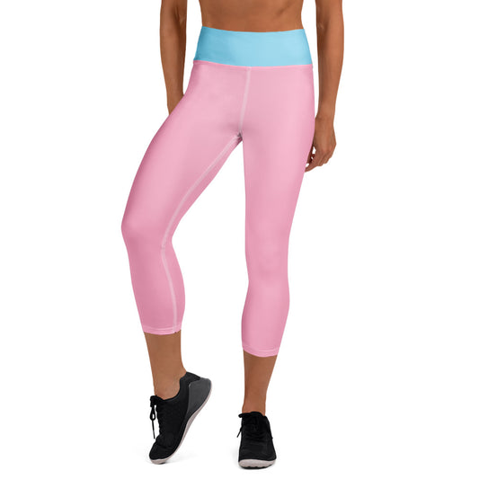 Pink and blue Christian yoga leggings from Spirit Wear modeled in a cropped style with black sneakers