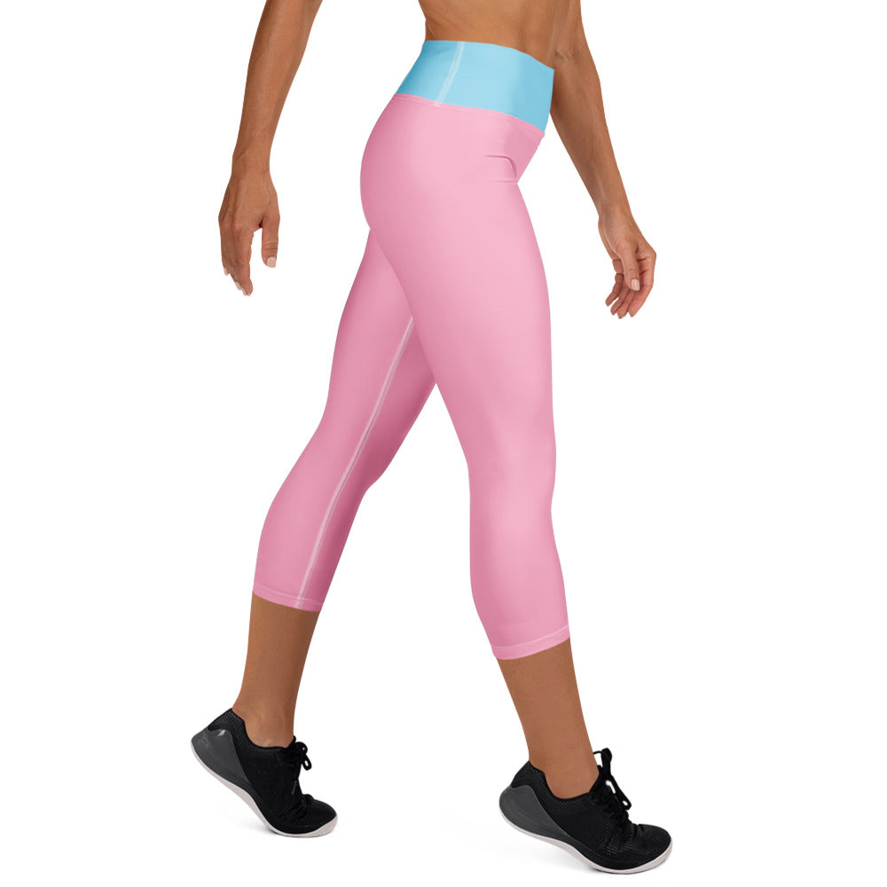 Pink and blue christian yoga leggings by Spirit Wear modeled with black athletic shoes