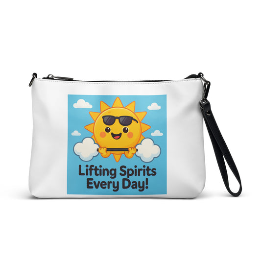 White inspirational crossbody bag with cheerful sun graphic and Lifting Spirits Every Day text