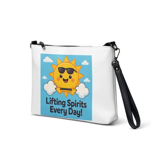 Inspirational crossbody bag with smiling sun and Lifting Spirits Every Day message in white