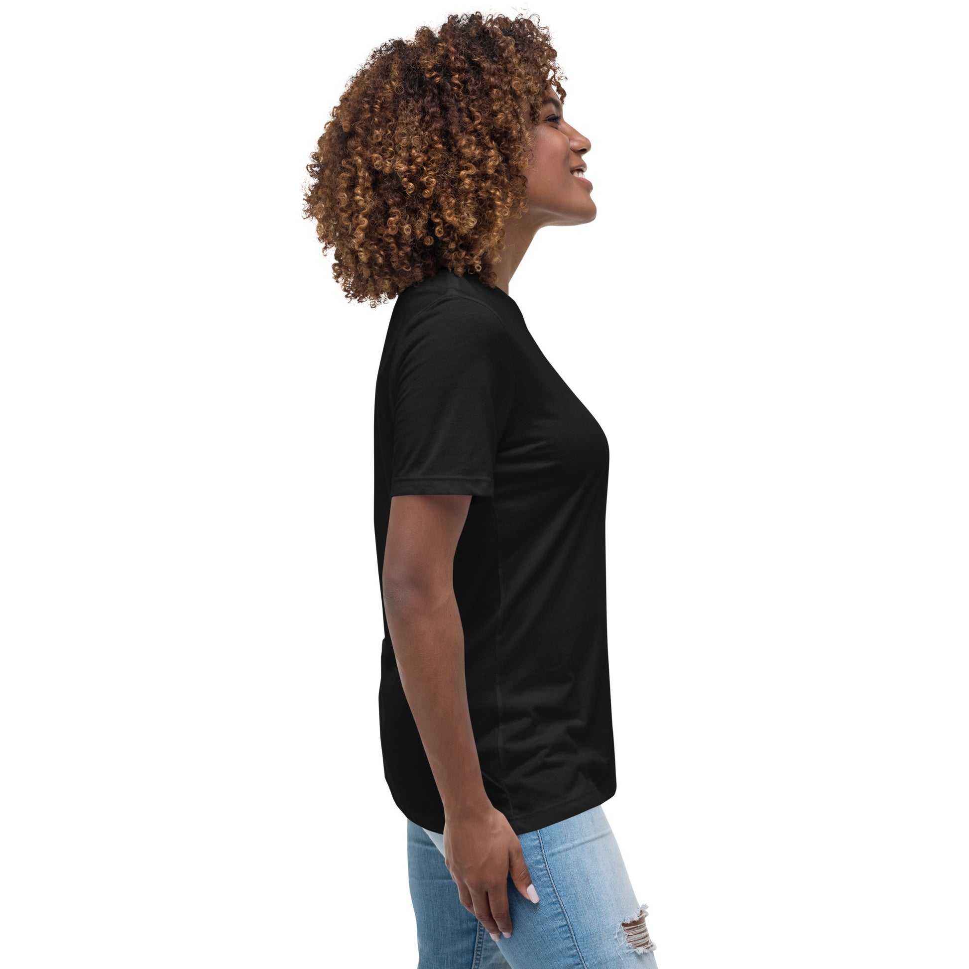 Spirit Wear black inspirational graphic tee for women modeled by standing woman in light blue ripped jeans