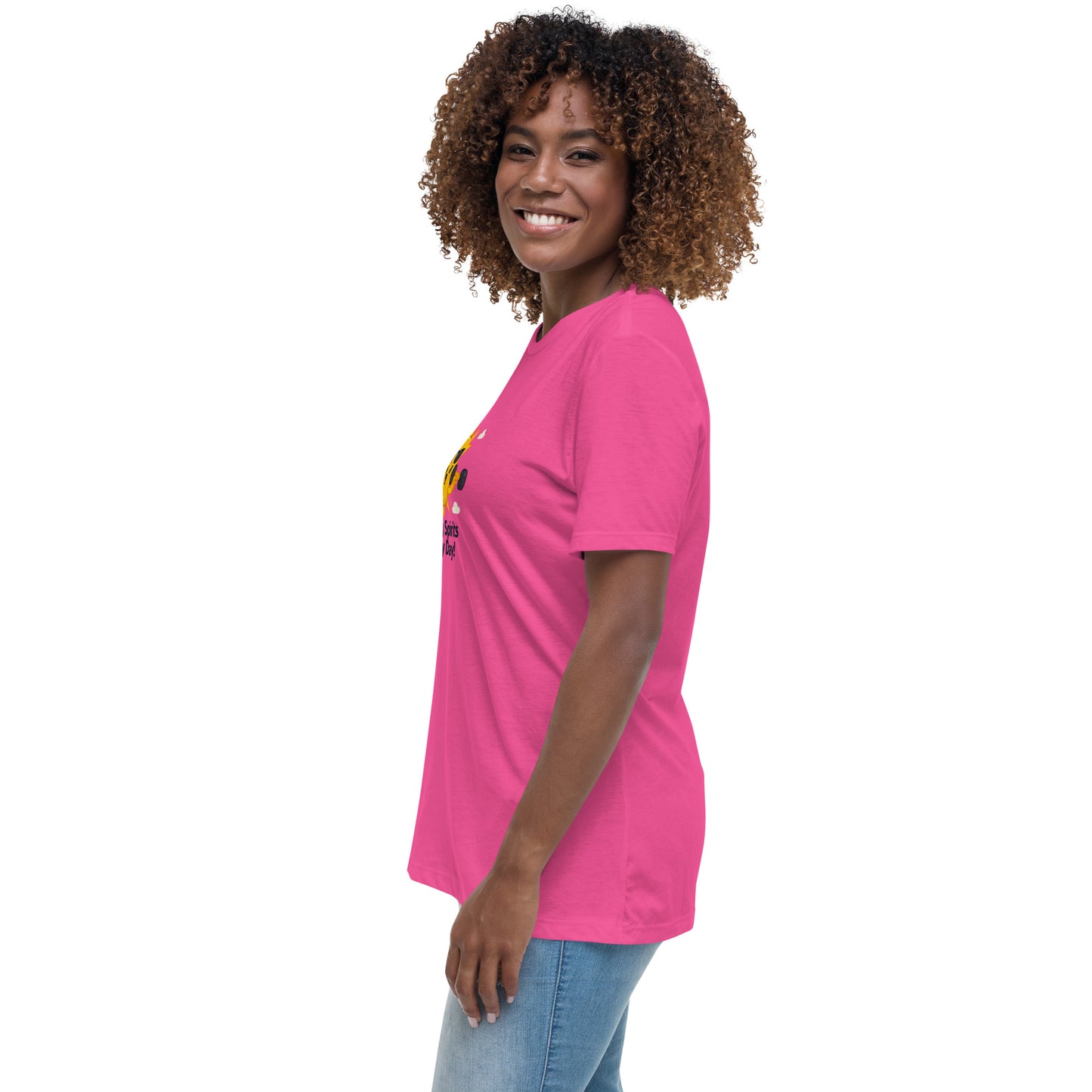 Woman wearing a pink inspirational graphic tee for women by Spirit Wear, smiling and standing sideways