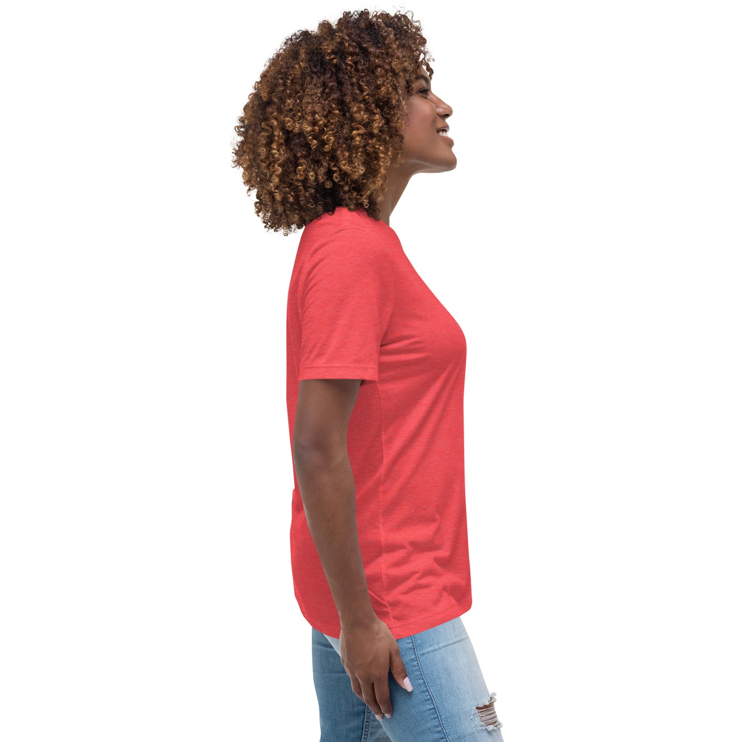 Woman wearing a red inspirational graphic tee for women paired with blue ripped jeans on white background