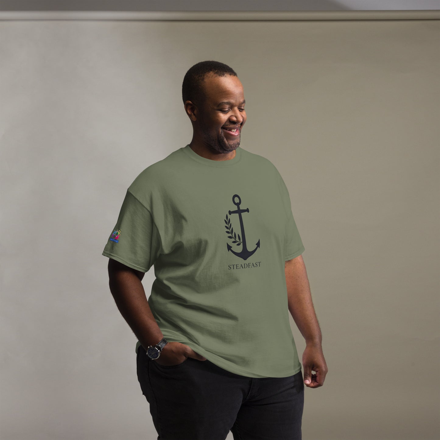 Spirit Wear Christian t-shirt withchor design olive green tee with anchor Steadfast graphic worn by smiling man