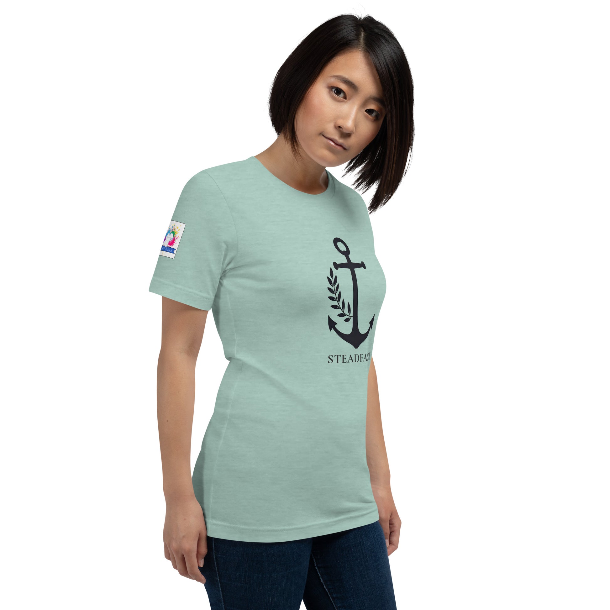 Spirit Wear model wearing mint green Christian anchor shirt for men and women with navy anchor graphic and steadfast text