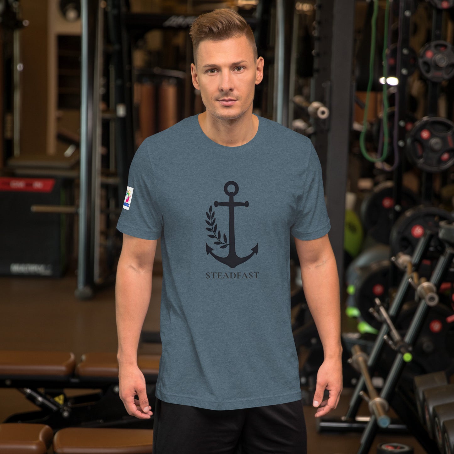 Man wearing slate blue Christian anchor shirt for men and women with black anchor Steadfast design in gym
