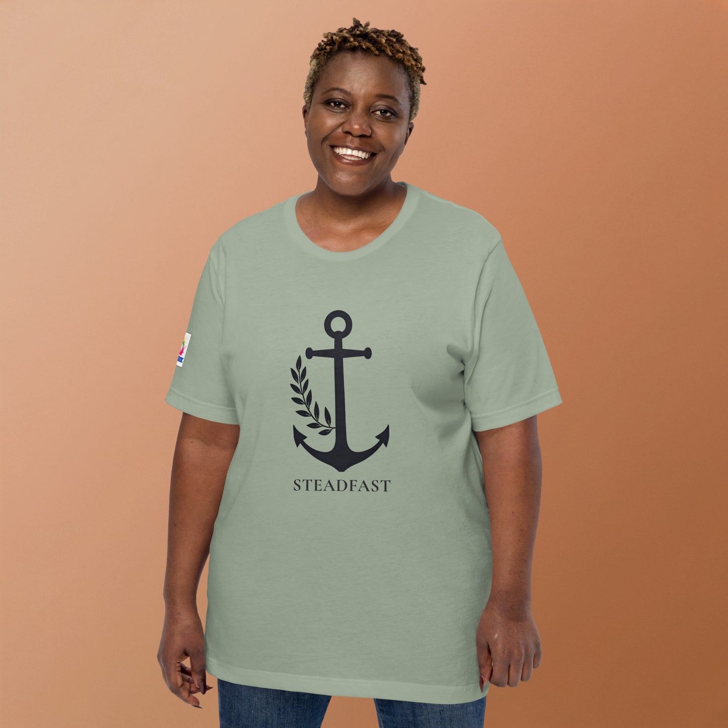 Christian anchor shirt for men and women shown on smiling woman wearing sage green tee with black anchor design